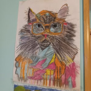 Black cat picture with abstract art on bottom done with pastels